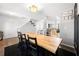 Bright dining area featuring a large wooden table and an open-concept design at 625 Outlook Way, Atlanta, GA 30349