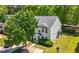 Two-story home with well-maintained lawn, mature trees, and a paved driveway leading to the front entrance at 625 Outlook Way, Atlanta, GA 30349