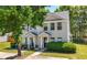 Inviting two-story townhome showcasing manicured lawn and covered entrance at 625 Outlook Way, Atlanta, GA 30349