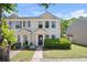 Charming two-story townhome with landscaped front yard and inviting entrance at 625 Outlook Way, Atlanta, GA 30349