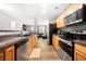 Updated kitchen featuring stainless steel appliances and an open view to the living room at 625 Outlook Way, Atlanta, GA 30349