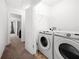 This laundry room has a washer and dryer at 625 Outlook Way, Atlanta, GA 30349