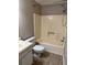 Full bathroom with vanity, toilet and shower-tub combination with tile floor at 861 Creek Nw Trl, Kennesaw, GA 30144