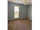 Bedroom featuring neutral walls and carpet, a ceiling fan, and window with blinds at 861 Creek Nw Trl, Kennesaw, GA 30144