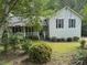 Charming single-Gathering home with covered porch and beautiful landscaped yard at 861 Creek Nw Trl, Kennesaw, GA 30144