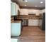 Traditional kitchen with white cabinets and stainless-steel appliances at 861 Creek Nw Trl, Kennesaw, GA 30144