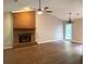 Spacious living room with brick fireplace and hardwood floors at 861 Creek Nw Trl, Kennesaw, GA 30144