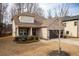 Charming brick home with manicured lawn and a two-car garage, creating a welcoming curb appeal at 8664 Spivey Village Trl, Jonesboro, GA 30236
