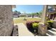 Inviting front porch view with well-maintained landscaping and neighborhood street at 8664 Spivey Village Trl, Jonesboro, GA 30236