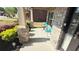 Cozy front porch with a seating area and manicured landscaping at 8664 Spivey Village Trl, Jonesboro, GA 30236