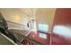 Hardwood floors visible from the staircase landing with front door view at 8664 Spivey Village Trl, Jonesboro, GA 30236