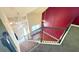 Carpeted staircase leading to upstairs area with open view of the front door at 8664 Spivey Village Trl, Jonesboro, GA 30236