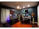 Modern studio equipped with multiple monitors, speakers, and an ergonomic chair at 8664 Spivey Village Trl, Jonesboro, GA 30236