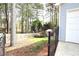 Fenced backyard with storage shed, trees, and plenty of space at 24 Lady Savannah Dr, Dallas, GA 30157