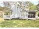 Exterior view of home with porch, bay window, and screened in area at 24 Lady Savannah Dr, Dallas, GA 30157