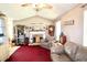 Cozy living room with stone fireplace, vaulted ceilings, and farmhouse-style decor at 24 Lady Savannah Dr, Dallas, GA 30157