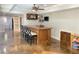 Basement bar area with bar seating and shelving for wine and glassware at 311 Carmichael Cir, Canton, GA 30115