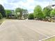 Outdoor basketball court for active recreation, surrounded by green spaces and well-kept grounds at 311 Carmichael Cir, Canton, GA 30115