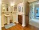 Classic bathroom with pedestal sink and granite counter at 311 Carmichael Cir, Canton, GA 30115