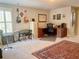 Bright and airy bonus room with hardwood floors and a large desk at 311 Carmichael Cir, Canton, GA 30115