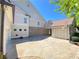 View of the exterior garage and drive with attached basketball court at 311 Carmichael Cir, Canton, GA 30115