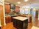 Open-concept kitchen with a center island and stainless steel appliances at 311 Carmichael Cir, Canton, GA 30115