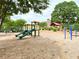 Community playground with slides and swings, offering a fun and safe environment for children at 311 Carmichael Cir, Canton, GA 30115