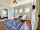 Cozy sitting room features hardwood floors and natural light at 311 Carmichael Cir, Canton, GA 30115