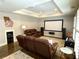 Inviting theater room with plush seating, a large screen, and Georgia 'A' decor at 311 Carmichael Cir, Canton, GA 30115