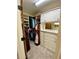 Organized walk-in closet with shelving and cabinet space at 311 Carmichael Cir, Canton, GA 30115
