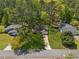 Birds eye view of property with expansive yard, mature trees and traditional design at 4425 Reef Rd, Marietta, GA 30066