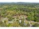 An aerial view captures the home's location within a tree-lined, residential neighborhood at 4425 Reef Rd, Marietta, GA 30066