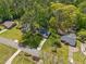 Aerial view of a home with mature trees in a residential neighborhood at 4425 Reef Rd, Marietta, GA 30066