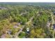An aerial view showcases this home nestled in a neighborhood with mature tree coverage at 4425 Reef Rd, Marietta, GA 30066