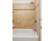 This bathroom features a shower with a tiled wall and a rainfall shower head at 4425 Reef Rd, Marietta, GA 30066