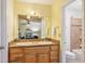 A double vanity bathroom featuring wood cabinets and tile floors at 4425 Reef Rd, Marietta, GA 30066