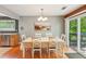 Bright dining room with access to a deck with plentiful nature views at 4425 Reef Rd, Marietta, GA 30066