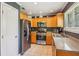 Well-lit kitchen with stainless steel appliances and ample cabinet space at 4425 Reef Rd, Marietta, GA 30066