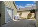 Cozy back patio with sliding doors and a grill, perfect for outdoor cooking and entertaining in a private setting at 4510 Flowering Br, Powder Springs, GA 30127