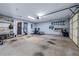 Garage with plenty of room for storage, pegboards, gym equipment and a workbench at 4510 Flowering Br, Powder Springs, GA 30127