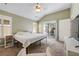 Spacious bedroom with vaulted ceilings, and sliding glass doors to outdoor patio at 4510 Flowering Br, Powder Springs, GA 30127