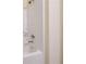 Shower stall with white tile surround, chrome fixtures, and convenient built-in shelving at 4510 Flowering Br, Powder Springs, GA 30127