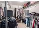 Walk-in closet with ample storage space at 4510 Flowering Br, Powder Springs, GA 30127