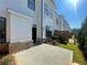 Backyard patio with a white exterior and fenced yard at 5022 Buice Crest Court, Buford, GA 30518