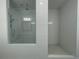 Modern bathroom featuring dual shower with white subway tile and glass enclosure at 5022 Buice Crest Court, Buford, GA 30518
