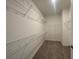 Walk-in closet with wire shelving for optimal storage at 5022 Buice Crest Court, Buford, GA 30518