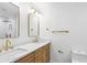 Bright bathroom boasts double sinks, modern fixtures, and hardwood cabinets at 800 Kiowa Ne Dr, Marietta, GA 30060