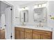 Bathroom showcases double sinks, modern fixtures, and hardwood cabinets at 800 Kiowa Ne Dr, Marietta, GA 30060