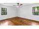 Bedroom with hardwood floors, and large windows providing natural light at 800 Kiowa Ne Dr, Marietta, GA 30060
