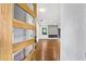 Bright entryway features a modern wood and glass front door, leading into an open-concept living space at 800 Kiowa Ne Dr, Marietta, GA 30060